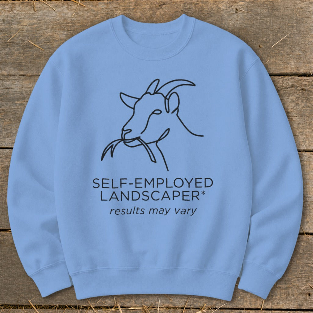 Light blue crewneck sweatshirt with a black line drawing of a goat eating grass and text.