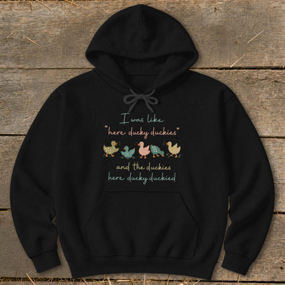 Black hoodie with ducks and text: "I was like 'here ducky duckies' and the duckies here ducky duckied."
