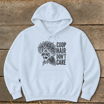 White hoodie with a black illustration of a crested chicken and text "COOP HAIR DON'T CARE."