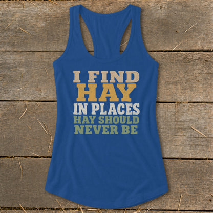 Blue tank top with "I FIND HAY IN PLACES HAY SHOULD NEVER BE" text.