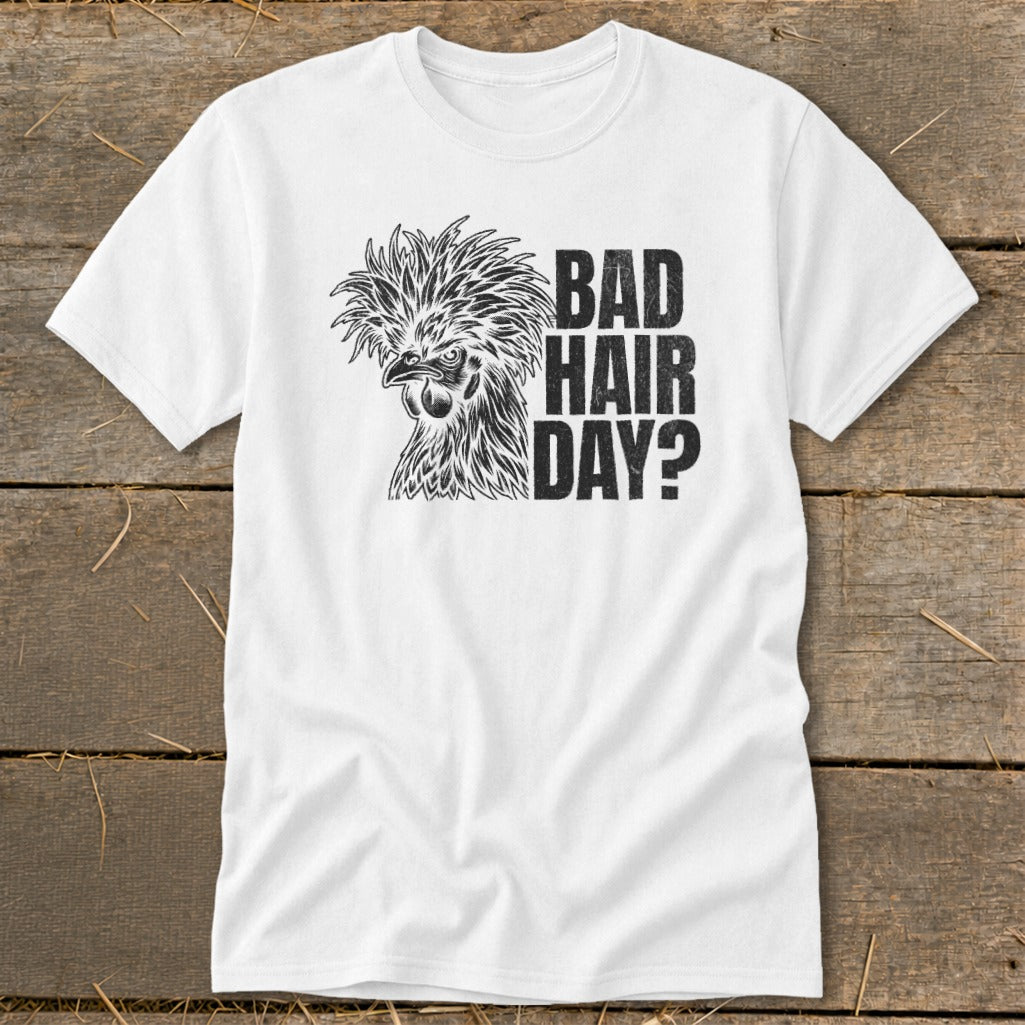 White t-shirt with black graphic of a fluffy chicken and "BAD HAIR DAY?" text.
