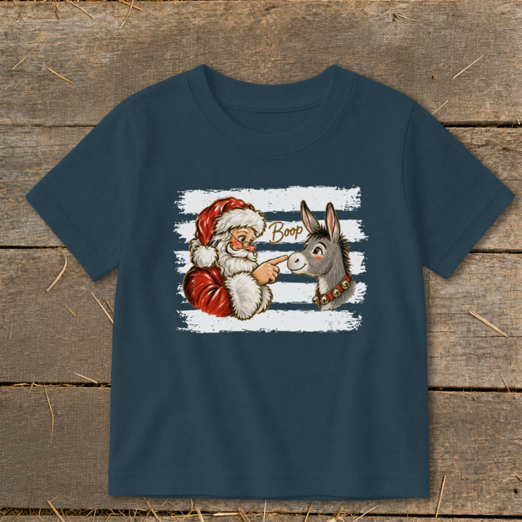 Santa pointing at a donkey with "Boop" text on a striped background.