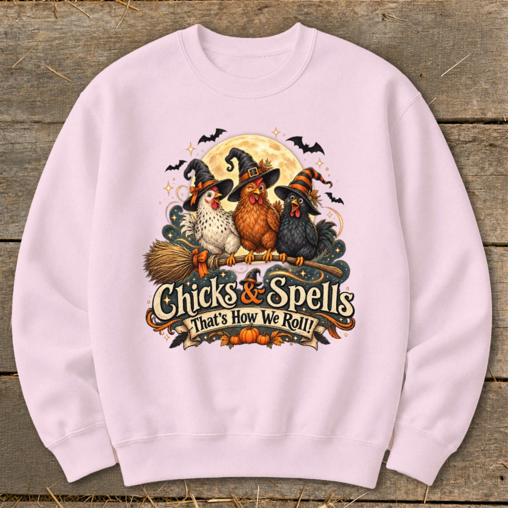 Three witch-hatted chickens ride a broomstick with "Chicks & Spells" text.