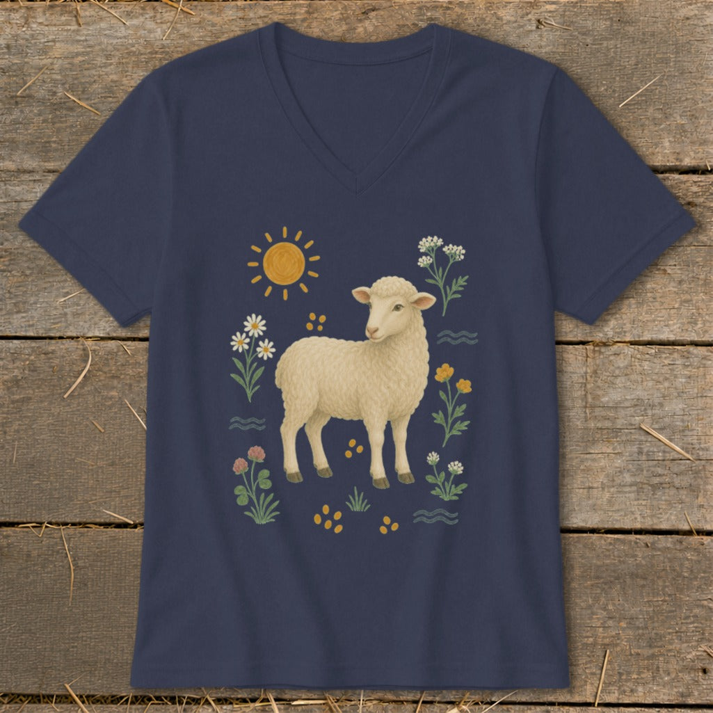 Navy v-neck t-shirt with a cream-colored sheep illustration surrounded by flowers and a sun.