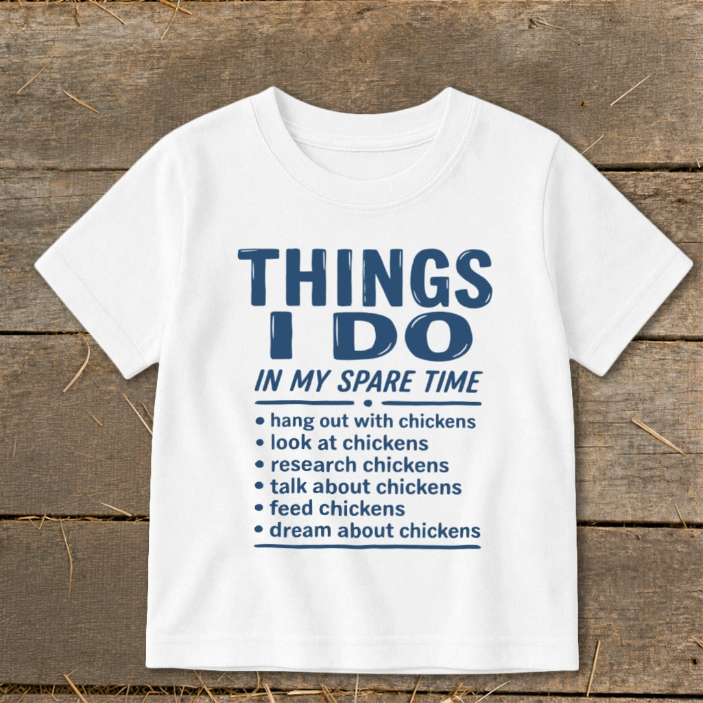 White t-shirt with "Things I Do In My Spare Time" and a list about chickens.