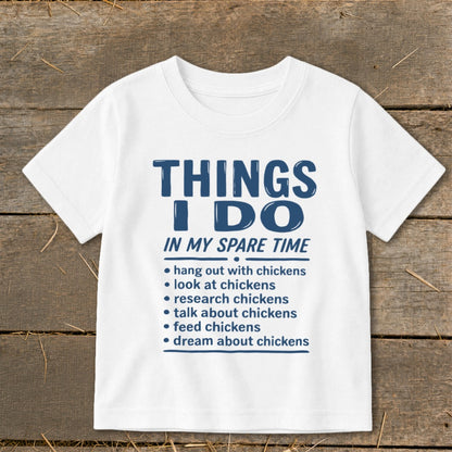 White t-shirt with "Things I Do In My Spare Time" and a list about chickens.