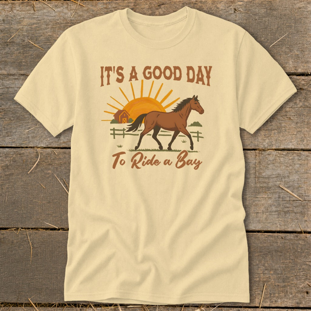 T-shirt with "It's a good day To Ride a Bay" text and a horse graphic.