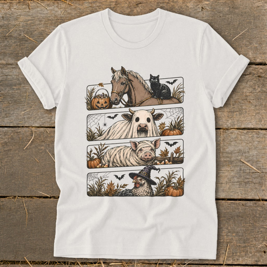 T-shirt with four Halloween-themed animal illustrations: horse, cow ghost, mummy pig, and witch chicken.