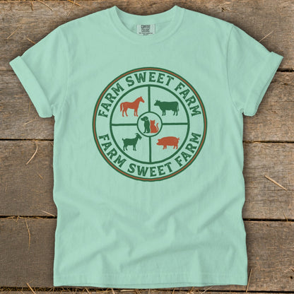 Light blue t-shirt with circular farm animals and text "Farm Sweet Farm" logo.