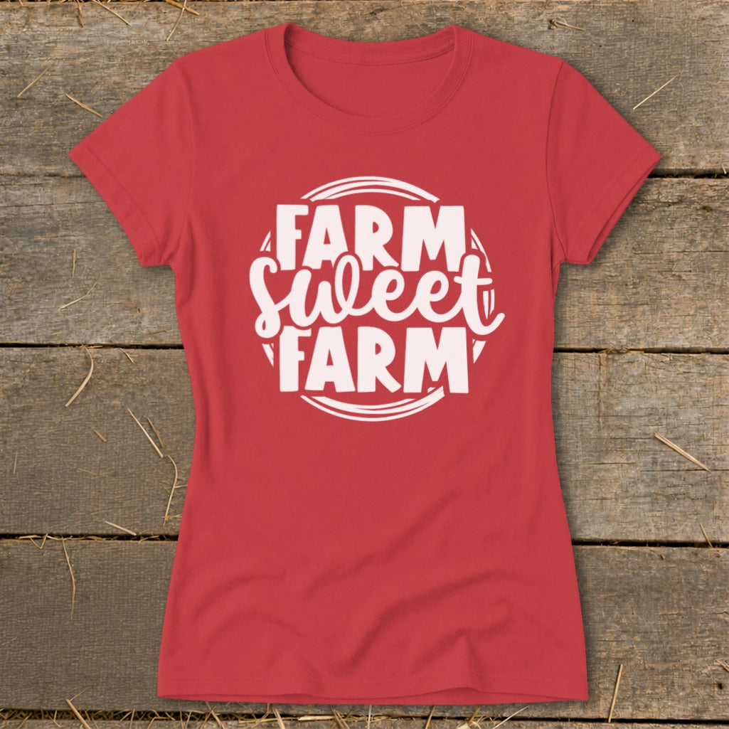 Red t-shirt with white text reading "Farm Sweet Farm" inside a circular design.