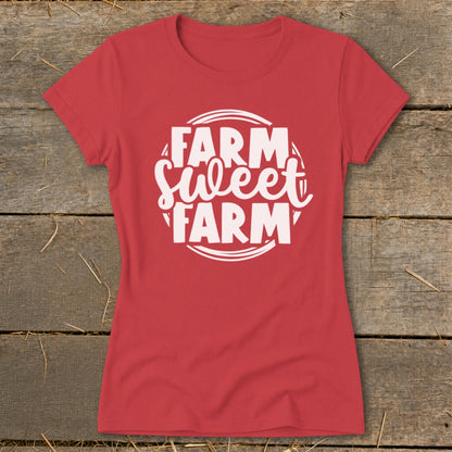 Red t-shirt with white text reading "Farm Sweet Farm" inside a circular design.
