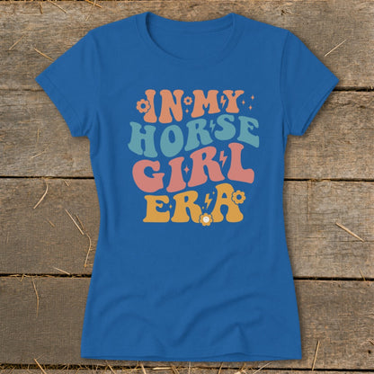 Blue t-shirt with "In My Horse Girl Era" text in groovy font and colors.