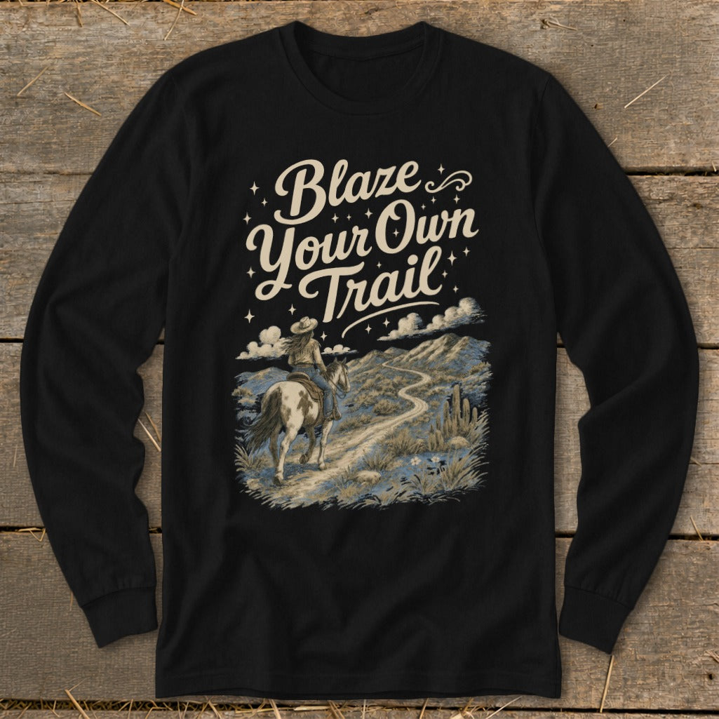 Black long-sleeve shirt with "Blaze Your Own Trail" text and a horseback rider.