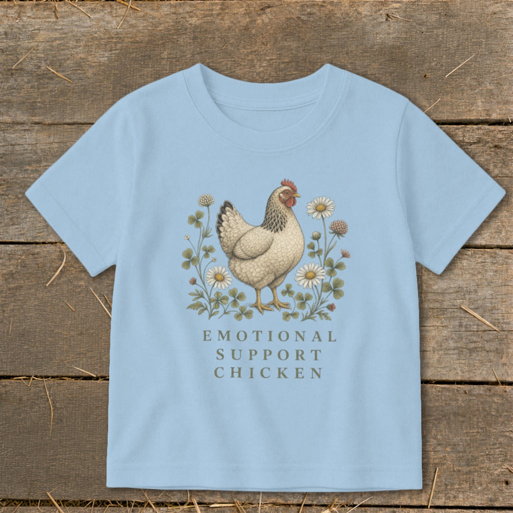 Light blue t-shirt with a chicken and flowers graphic and "Emotional Support Chicken" text.