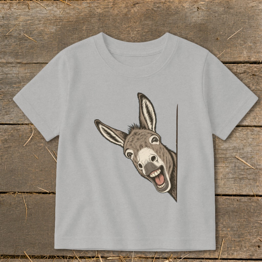 Gray t-shirt with a smiling donkey peeking from the side.