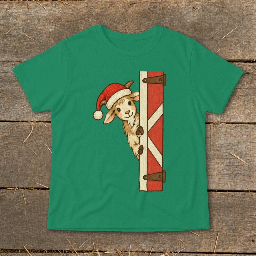 Green t-shirt with a Christmas llama peeking from a red barn door.