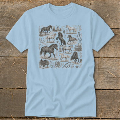 Light blue t-shirt with a repeating pattern of horses, saddles, and equestrian elements.