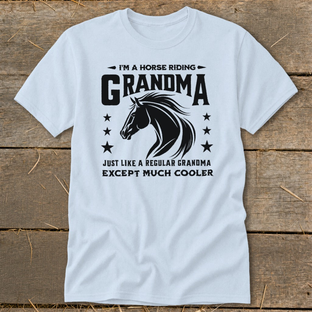 Light blue t-shirt with black text and horse graphic: "I'm a Horse Riding Grandma Just Like a Regular Grandma Except Much Cooler"