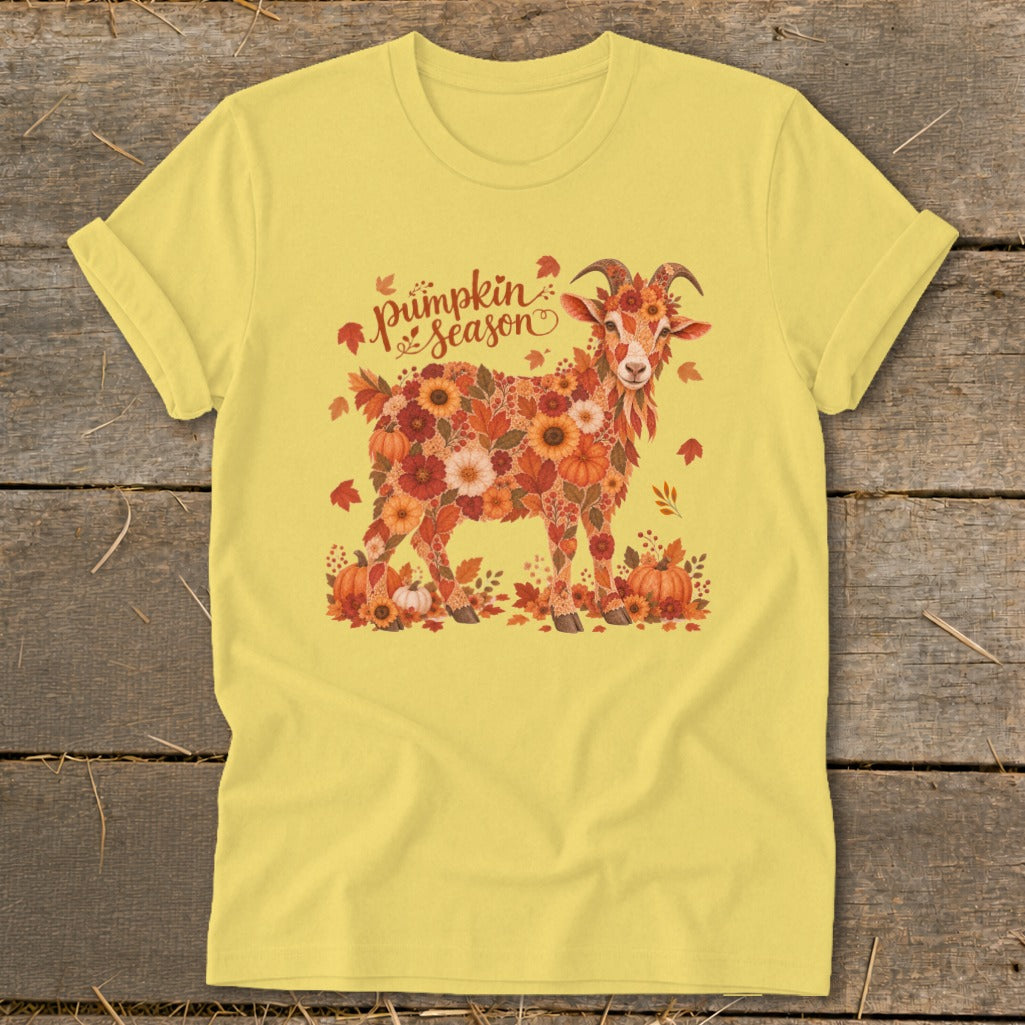 Yellow t-shirt with a goat made of autumn flowers, leaves, and pumpkins.