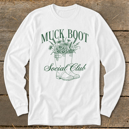 White long-sleeve shirt with green "Muck Boot Social Club" graphic.