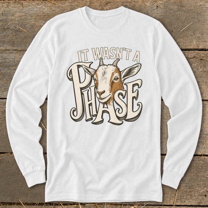 White long-sleeve shirt with goat graphic and text "IT WASN'T A PHASE".