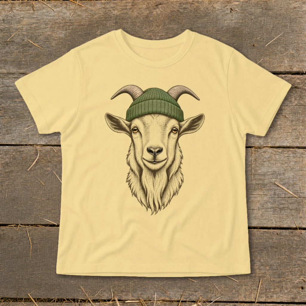 Pale yellow t-shirt featuring a detailed drawing of a goat wearing a green beanie.