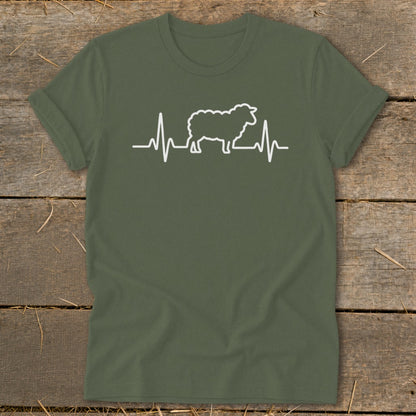 An olive green t-shirt featuring a white graphic of a sheep integrated into a heartbeat line.