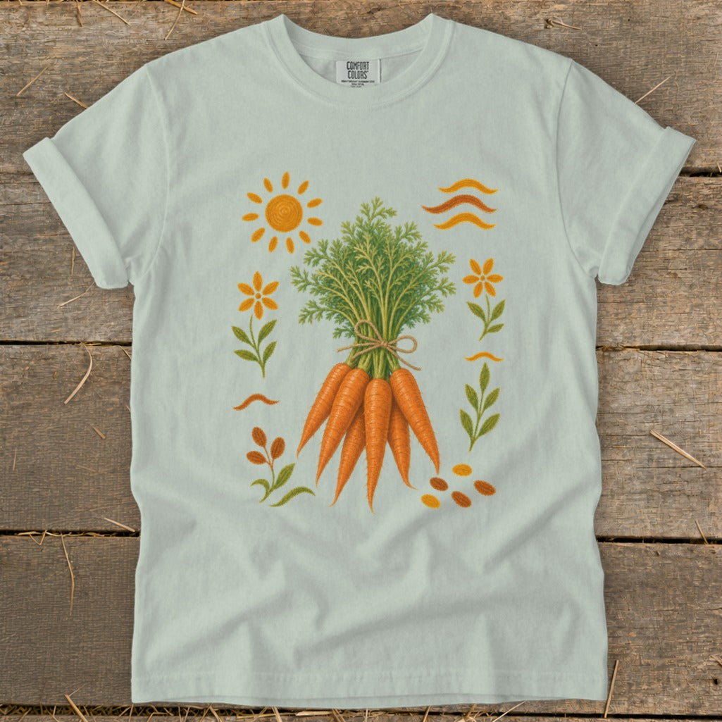 Light blue t-shirt with a bouquet of carrots and floral garden design.