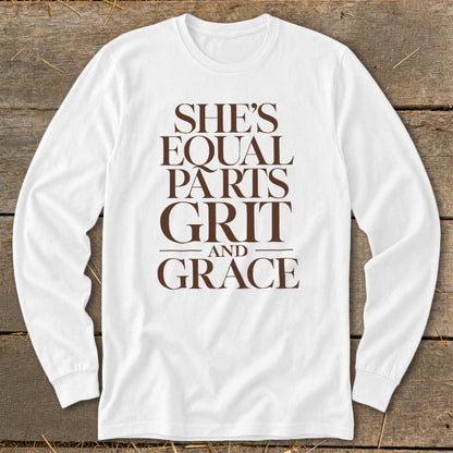 White long-sleeve t-shirt with brown text "She's Equal Parts Grit and Grace."