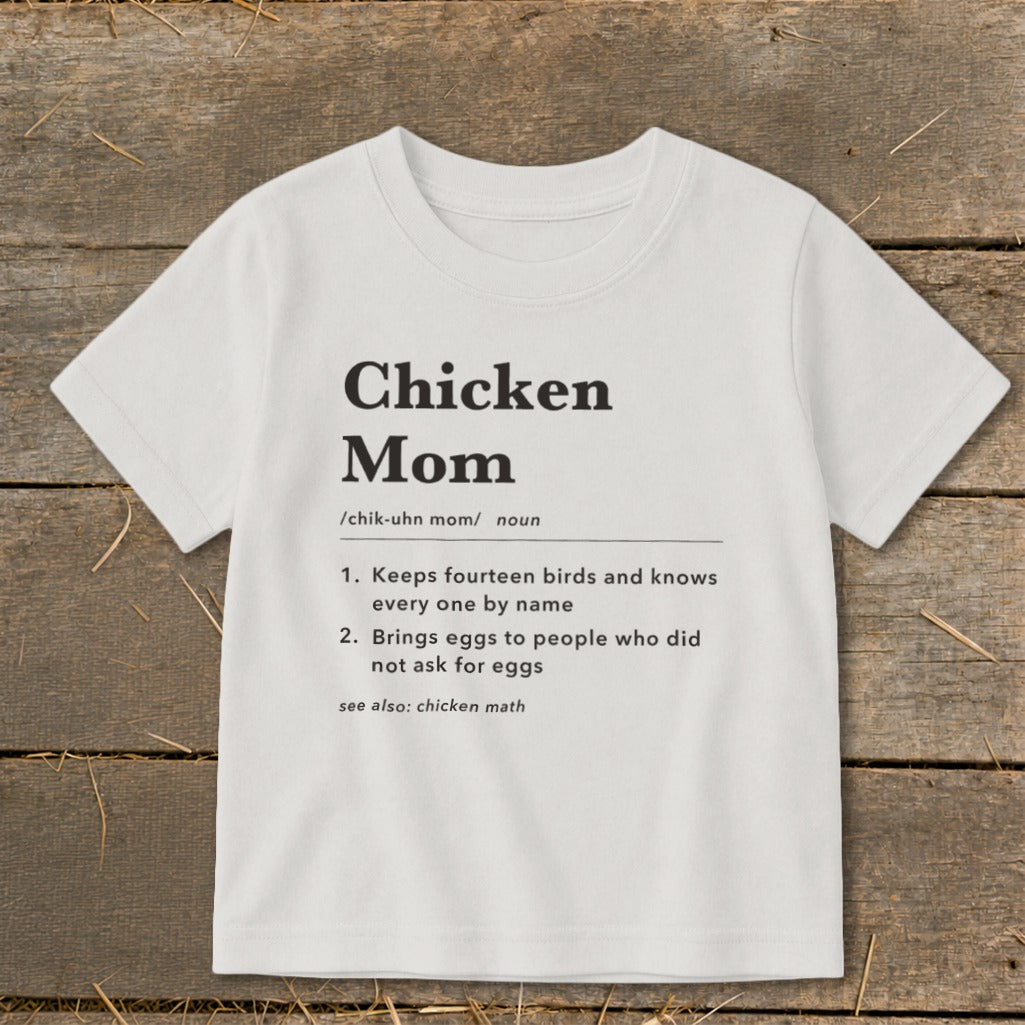 White t-shirt with "Chicken Mom" definition: keeps birds, knows them by name, brings eggs.