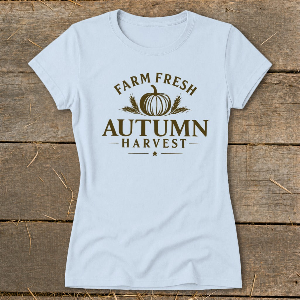 Light blue t-shirt with brown text "Farm Fresh Autumn Harvest" and pumpkin graphic.