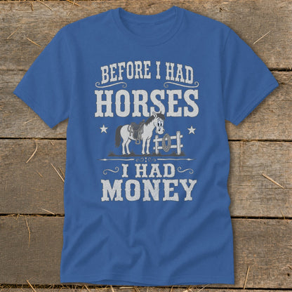Blue t-shirt with text "BEFORE I HAD HORSES I HAD MONEY" and cartoon horse graphic.
