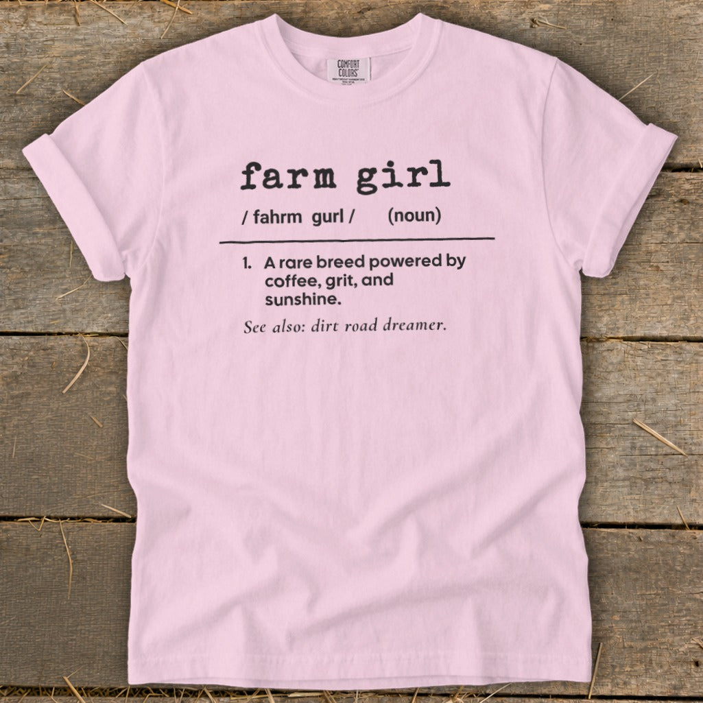 Pink t-shirt with "farm girl" definition: powered by coffee, grit, and sunshine.