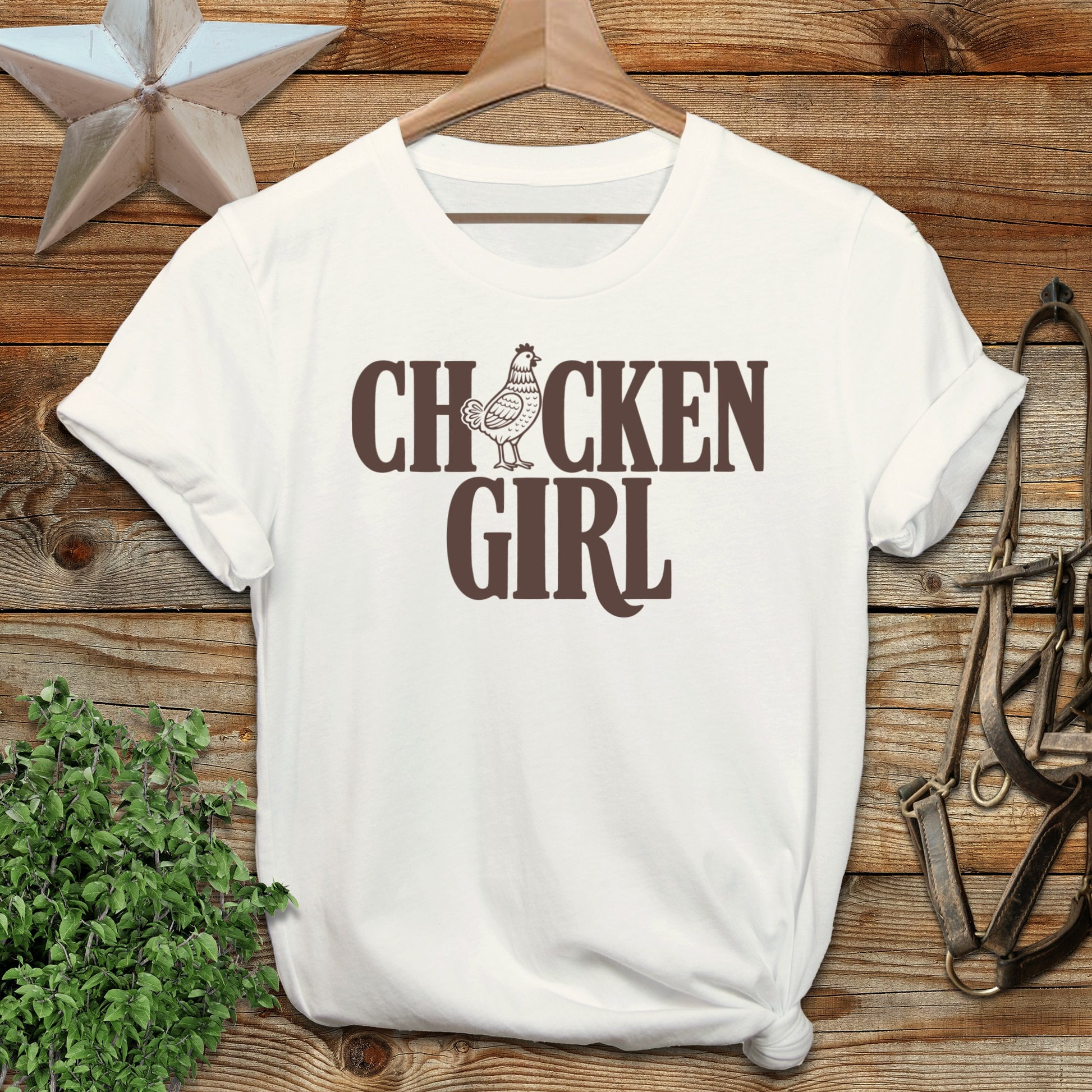White t-shirt with "Chicken Girl" text and chicken graphic.
