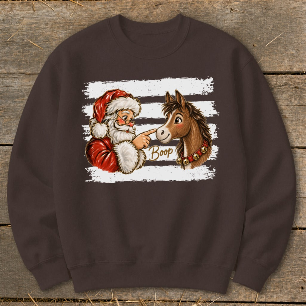 Santa boops a horse on the nose with the word "Boop" on a brown sweatshirt.