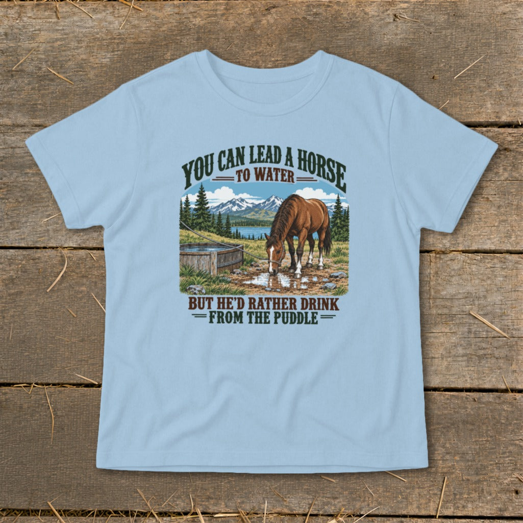Light blue t-shirt featuring a graphic of a horse drinking from a puddle with text above and below.