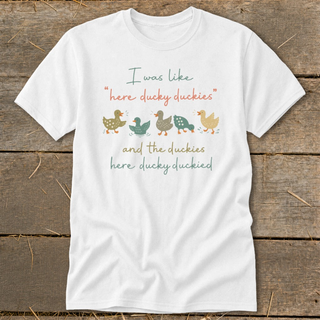 White t-shirt with ducks and text "I was like 'here ducky duckies' and the duckies here ducky duckied"