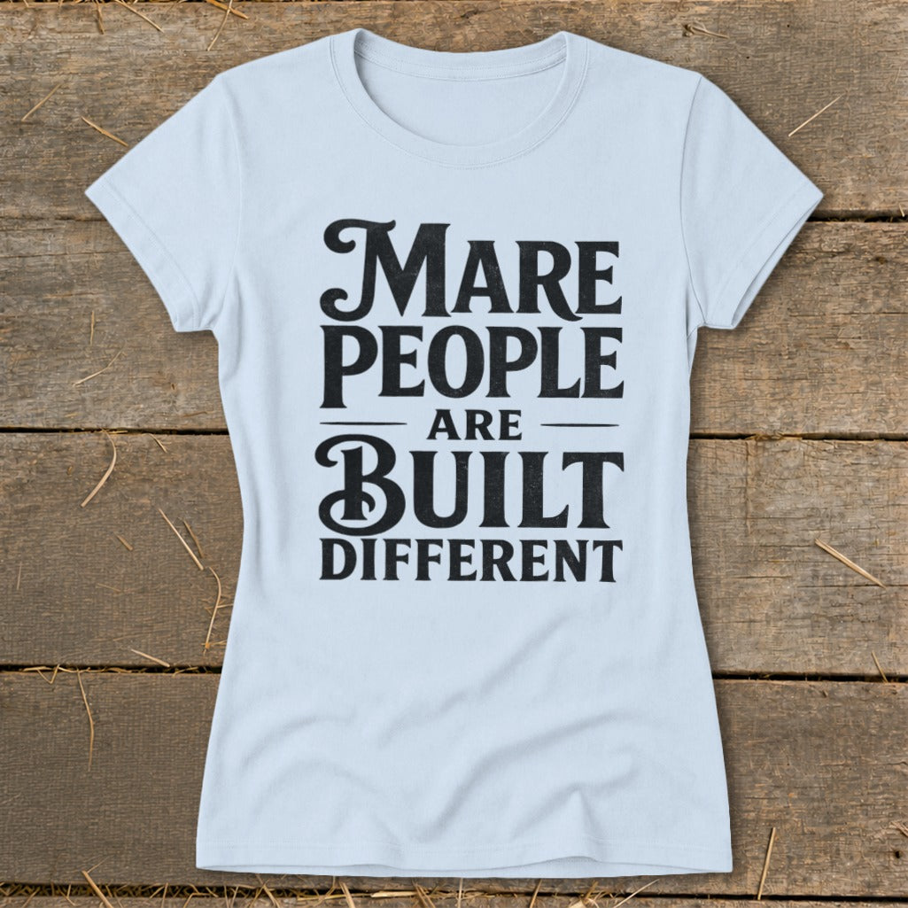 Light blue t-shirt with black text that reads "Mare people are built different".