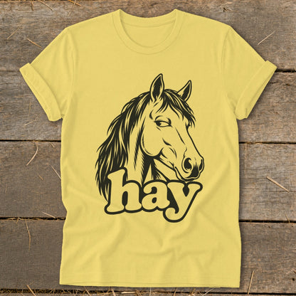 Yellow t-shirt with a black horse head graphic and the word "hay".