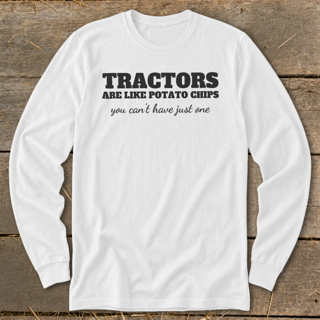 White long-sleeve shirt with text: "Tractors are like potato chips, you can't have just one."