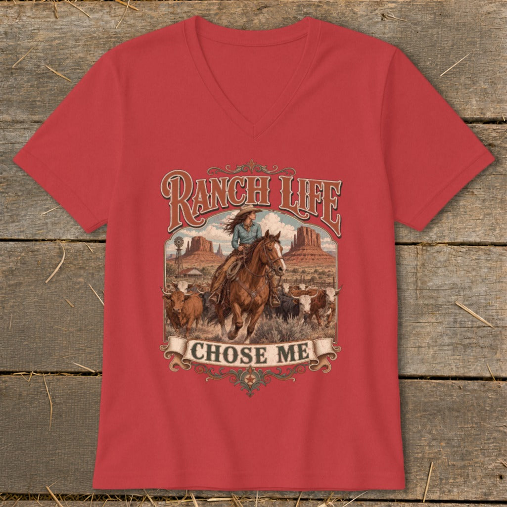 Red t-shirt with "RANCH LIFE CHOSE ME" graphic of a woman on horseback herding cattle.