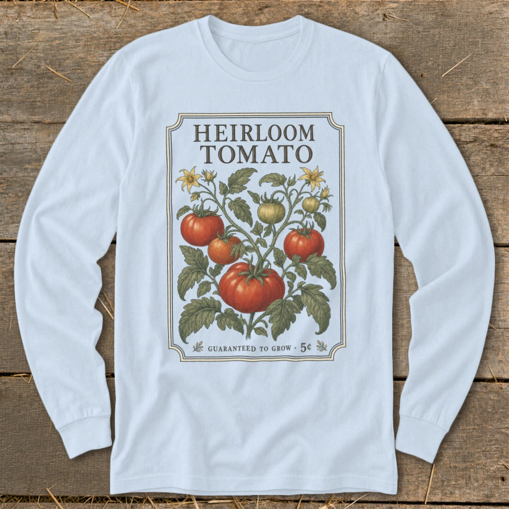 Light blue long-sleeve t-shirt with "HEIRLOOM TOMATO" and tomato plant illustration.