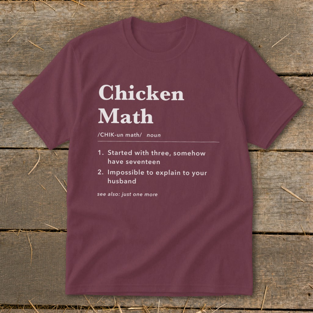 Maroon t-shirt with white text defining "Chicken Math".