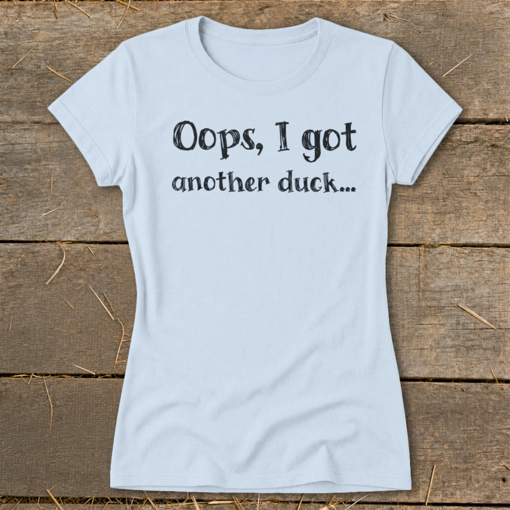Light blue t-shirt with black text reading "Oops, I got another duck..."