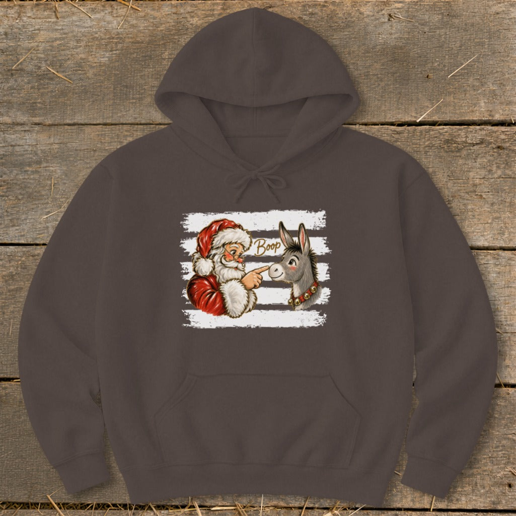 Santa boops a donkey on the nose, with the word "Boop" above.