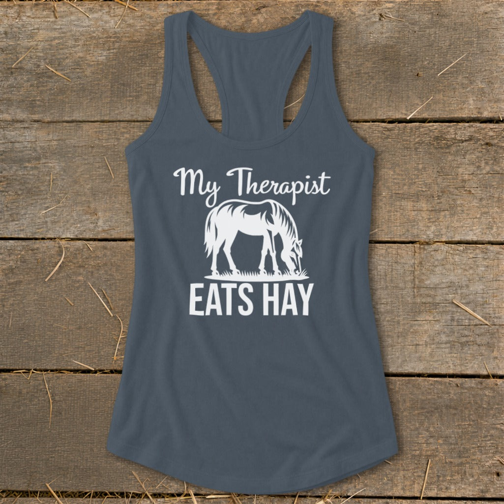 Tank top with white text "My Therapist EATS HAY" and horse graphic.