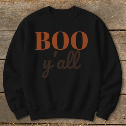 Black crewneck sweatshirt with "BOO y'all" text in orange and brown.