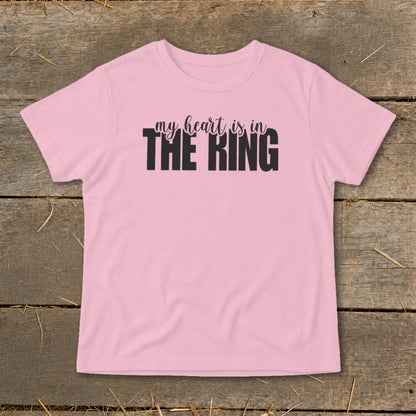 Pink t-shirt with black text "my heart is in THE RING".