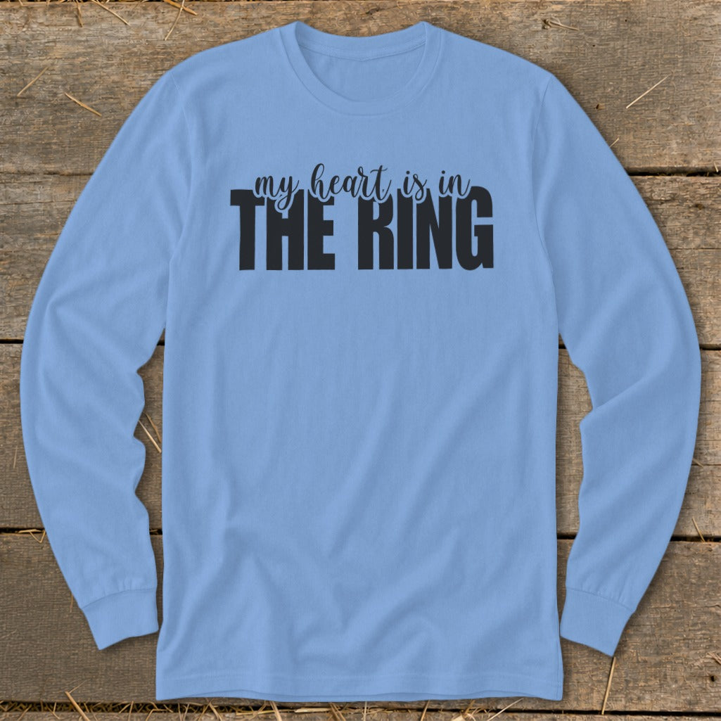 Light blue long-sleeve shirt with black text reading "my heart is in THE RING".