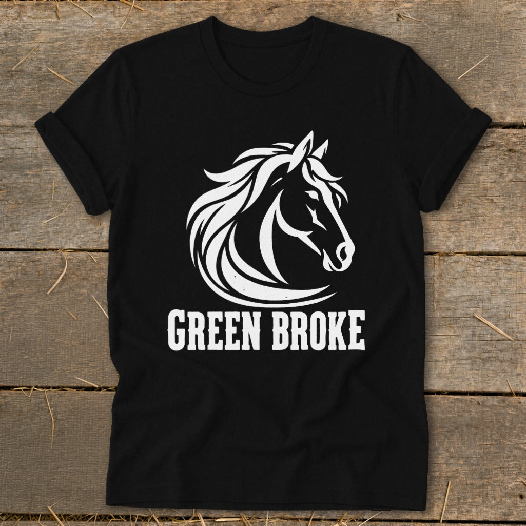 A black t-shirt features a white graphic of a horse head and the text GREEN BROKE.